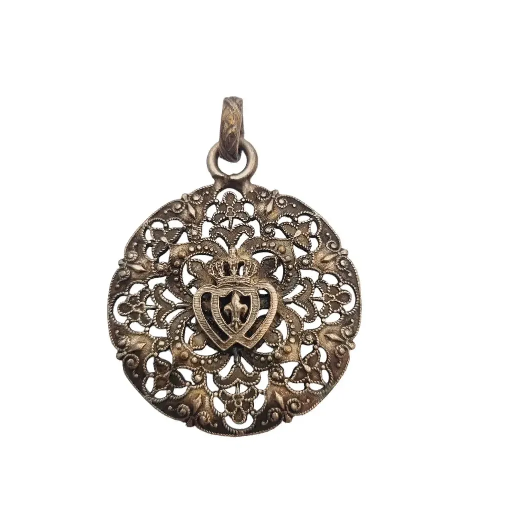 Antique silver Coeur Vendéen rosette, fleur-de-lis and intertwined hearts.